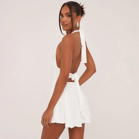Ego - Plunge Halterneck Open Back Flippy Hem Mini Skater Dress In White Slinky
