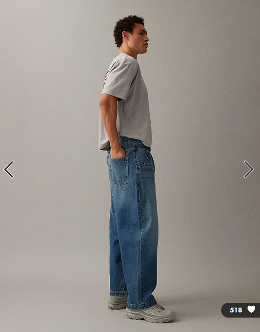 ASOS DESIGN relaxed tapered jeans in mid wash blue with pleats