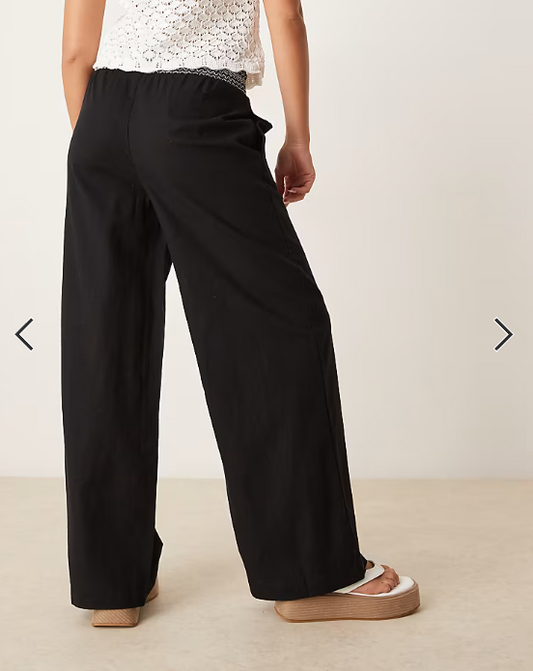 ASOS DESIGN linen blend pull on wide leg pants with shirred waist detail in black with cream trim