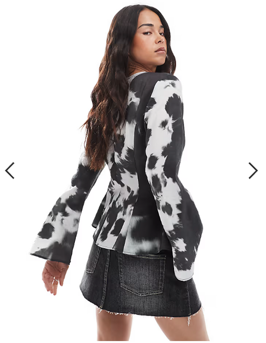ASOS DESIGN smocked waist detail long sleeve top in cow print