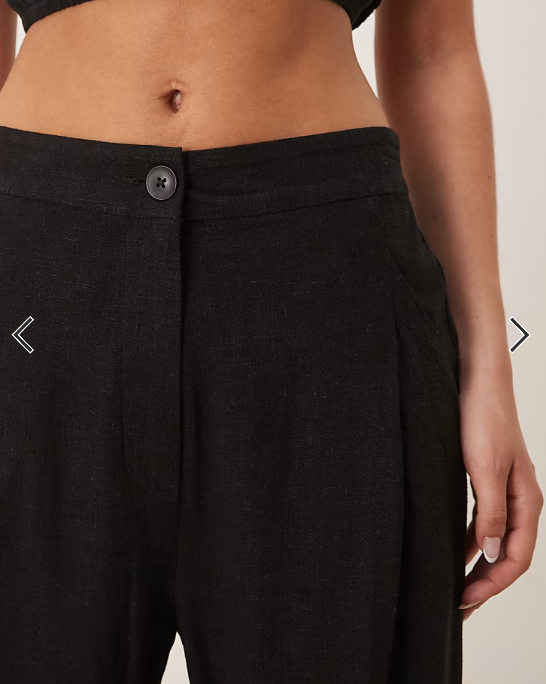 ASOS DESIGN pleat front tapered pants with linen in black