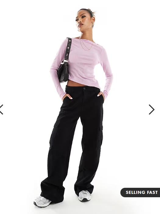 ASOS DESIGN sheer long sleeve top with asymmetric hem in pink