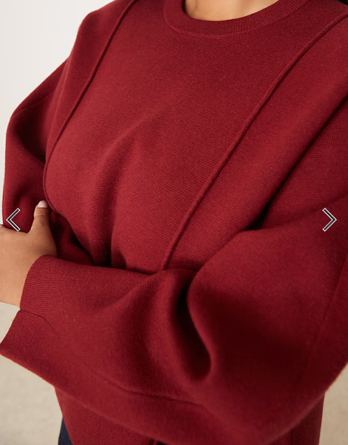 ASOS DESIGN Curve structured waisted jumper with shoulder pads in burgundy