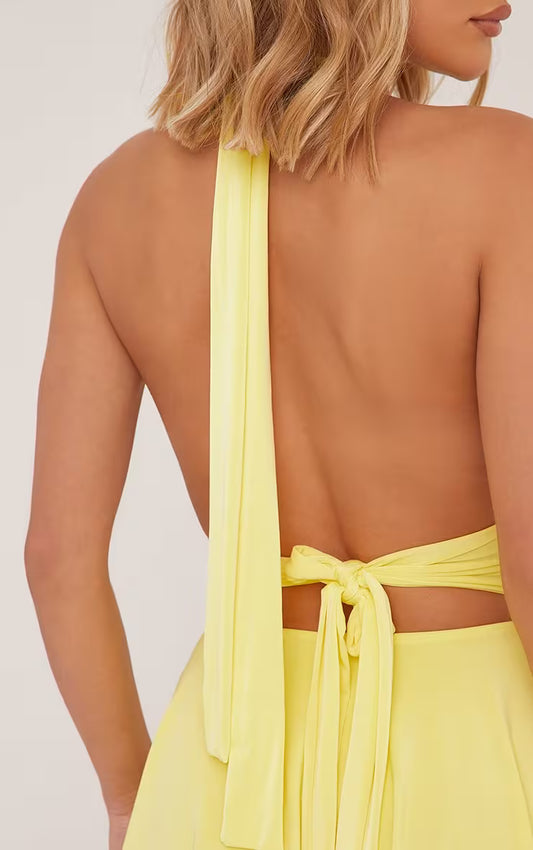 Ego - Plunge Halterneck Open Back Flippy Hem Mini Skater Dress In Pastel Yellow Slinky