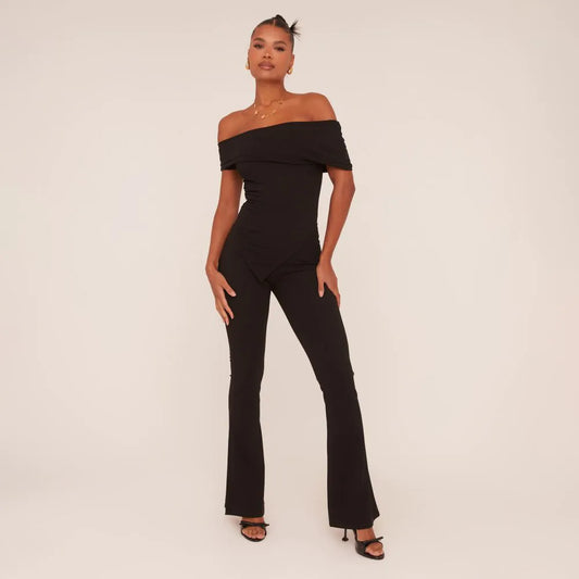 Asymmetric Bardot Flared Jumpsuit In Black Slinky