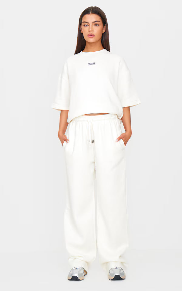 Cream Badge Detail Mid Rise Wide Leg Joggers