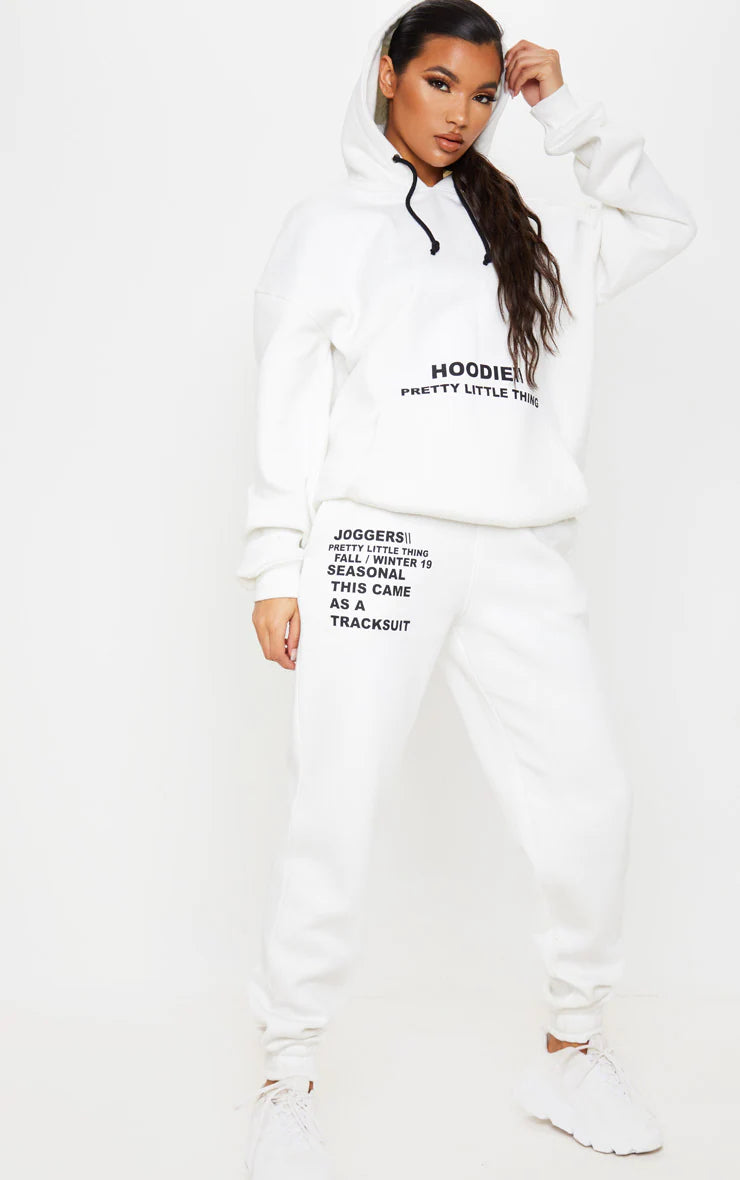 LOGO CREAM SLOGAN PRINTED JOGGERS