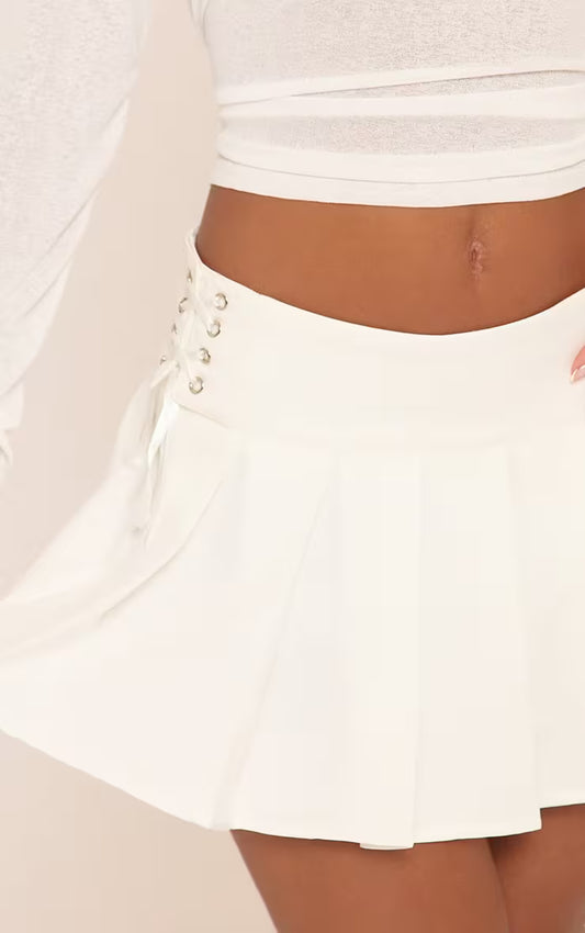 Ego - Mid Rise Lace Up Side Pleated Mini Skirt In White