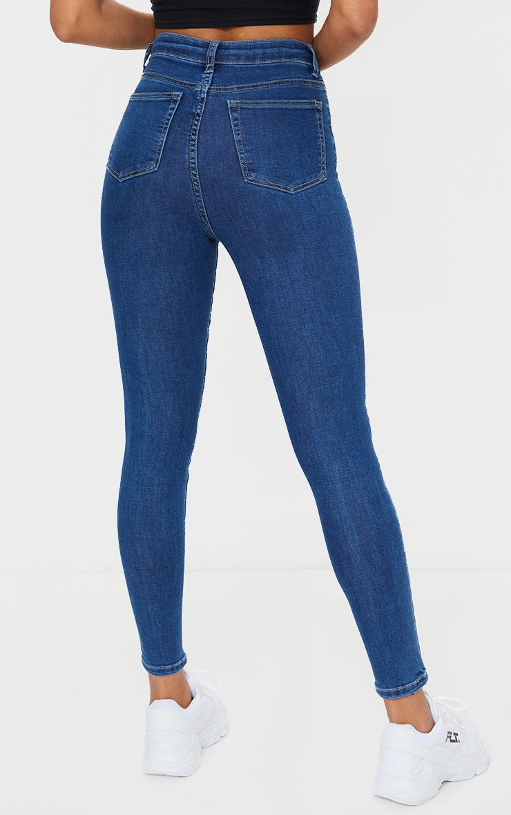 MID BLUE WASH KNEE RIP 5 POCKET SKINNY JEANS