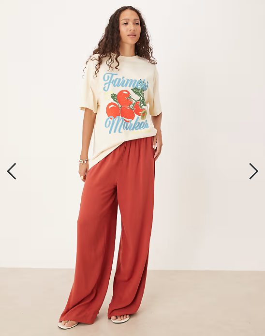 ASOS DESIGN oversized t-shirt with farmer tomato graphic in cream