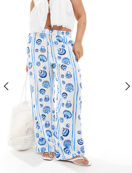 Vero Moda Curve wide leg trousers in blue seashell print