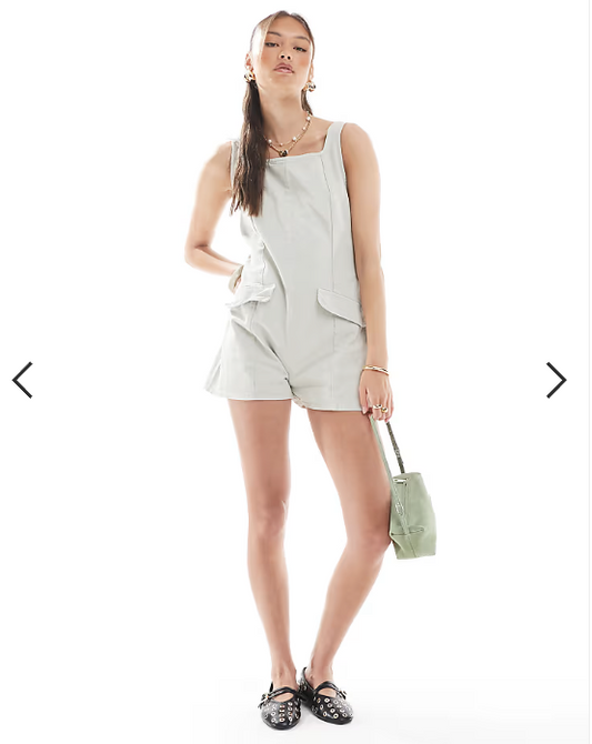 ASOS DESIGN denim scoop neck romper with pocket detail