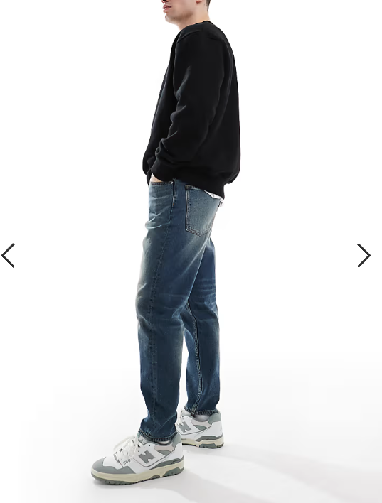 ASOS DESIGN tapered jeans with vintage tint in dark wash blue
