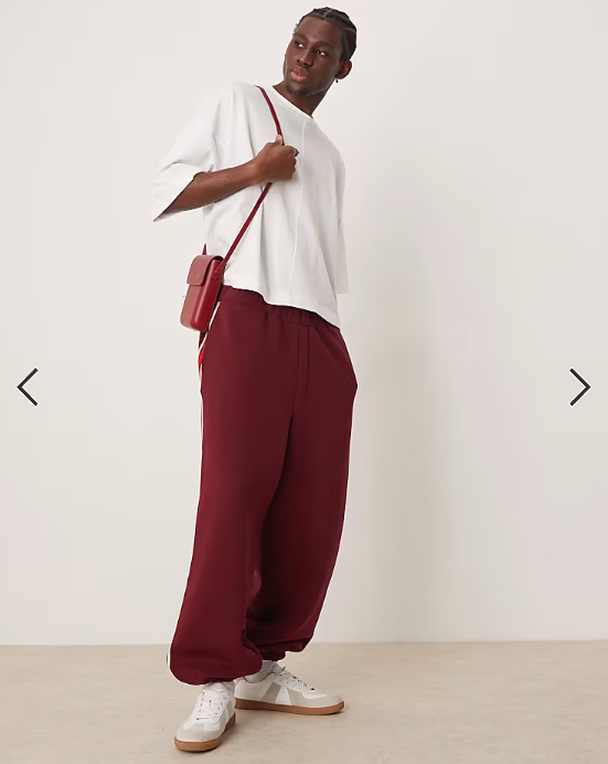 ASOS DESIGN baggy balloon jogger with taping in burgundy