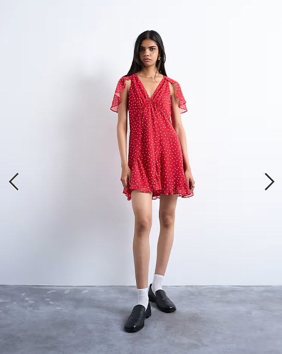 Topshop cape sleeve godet hem mini dress in red based spot