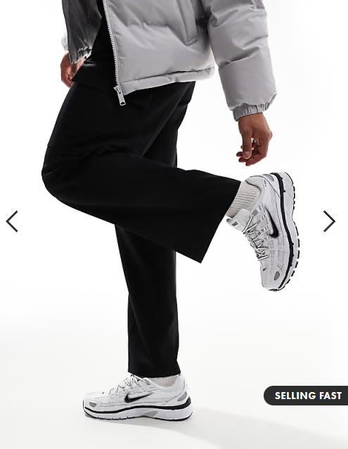 Nike P-6000 trainers in white and metallic silver