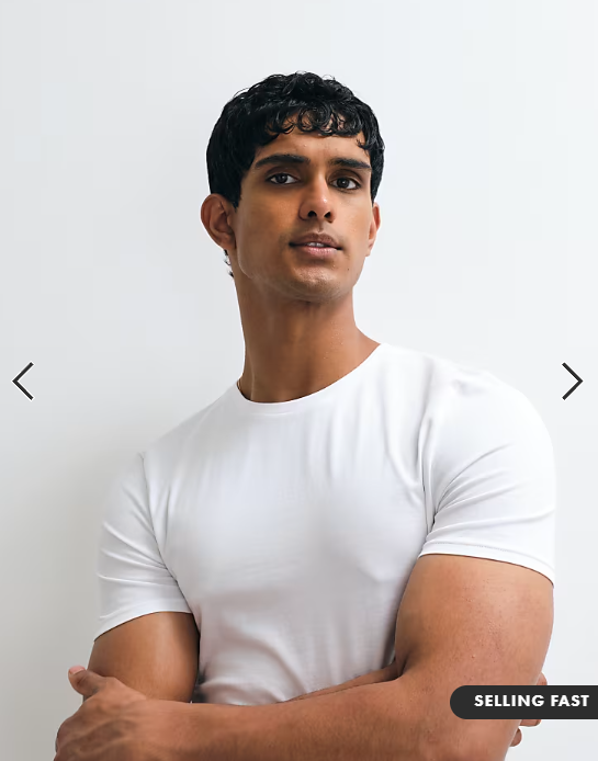 ASOS DESIGN essentials muscle fit T-shirt in white.