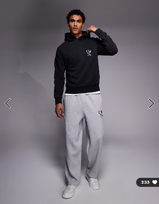 ADPT loose fit joggers with star logo in light grey