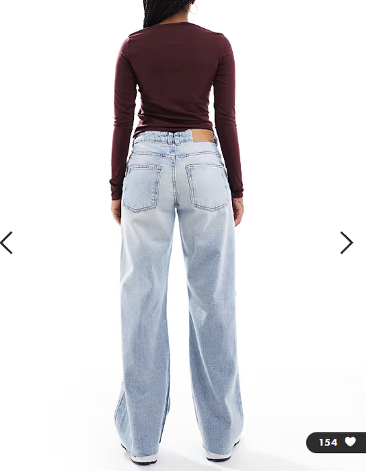 ASOS DESIGN low rise baggy jeans with rips in vintage wash