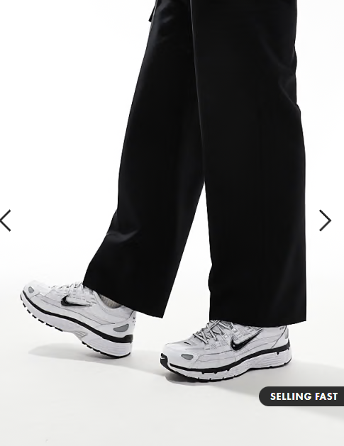 Nike P-6000 trainers in white and metallic silver