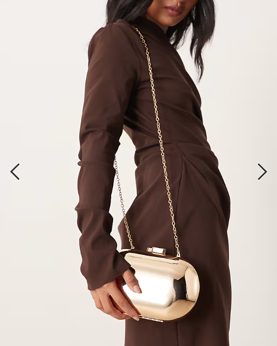 True Decadence oval hard clutch bag in gold
