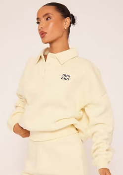 Sleeveless Button Up Top In Cream Rib