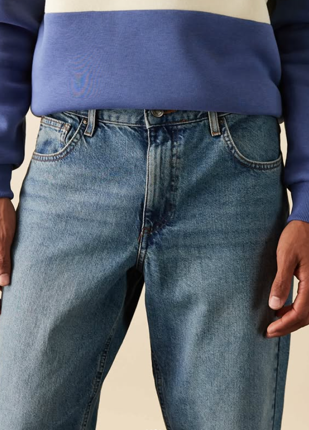 ASOS DESIGN tapered fit jeans in mid wash blue