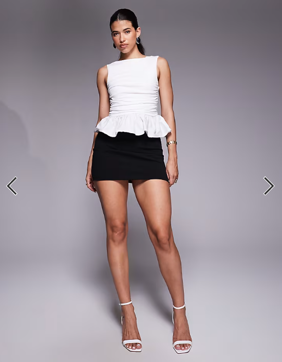 ASOS DESIGN asymmetric contrast fabric peplum hem top in ivory