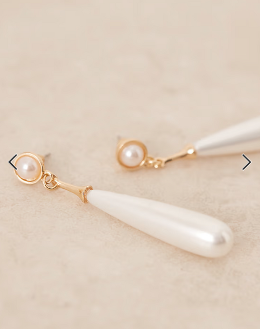 True Decadence long pearl drop earrings in gold