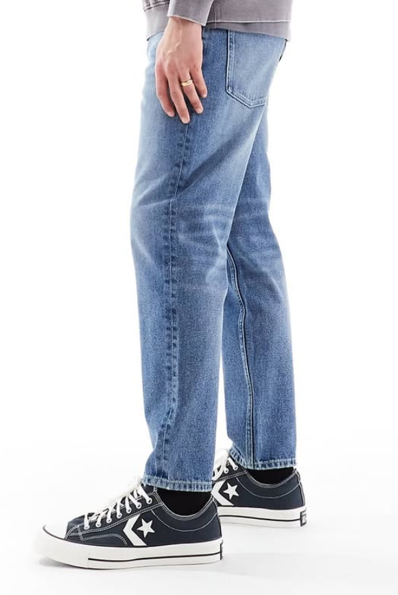 Asos - tapered fit jeans in mid wash blue