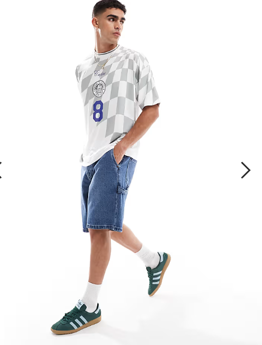 ASOS DESIGN oversized T-shirt with high build sports graphic in printed sports fabric .