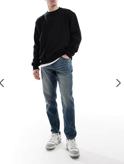 ASOS DESIGN tapered jeans with vintage tint in dark wash blue