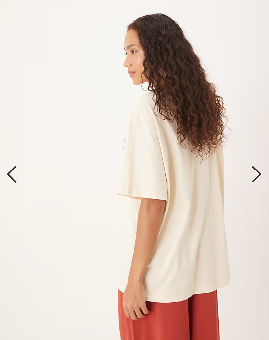 ASOS DESIGN oversized t-shirt with farmer tomato graphic in cream