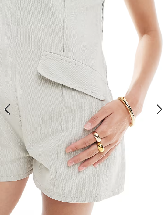 ASOS DESIGN denim scoop neck romper with pocket detail