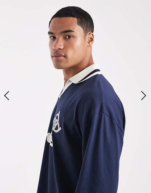 ASOS DESIGN oversized long sleeve polo with sports graphic in navy