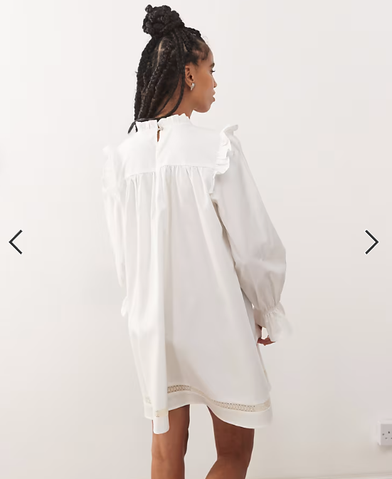 Reclaimed Vintage mini smock dress with inserted lace trims and ruffles in white