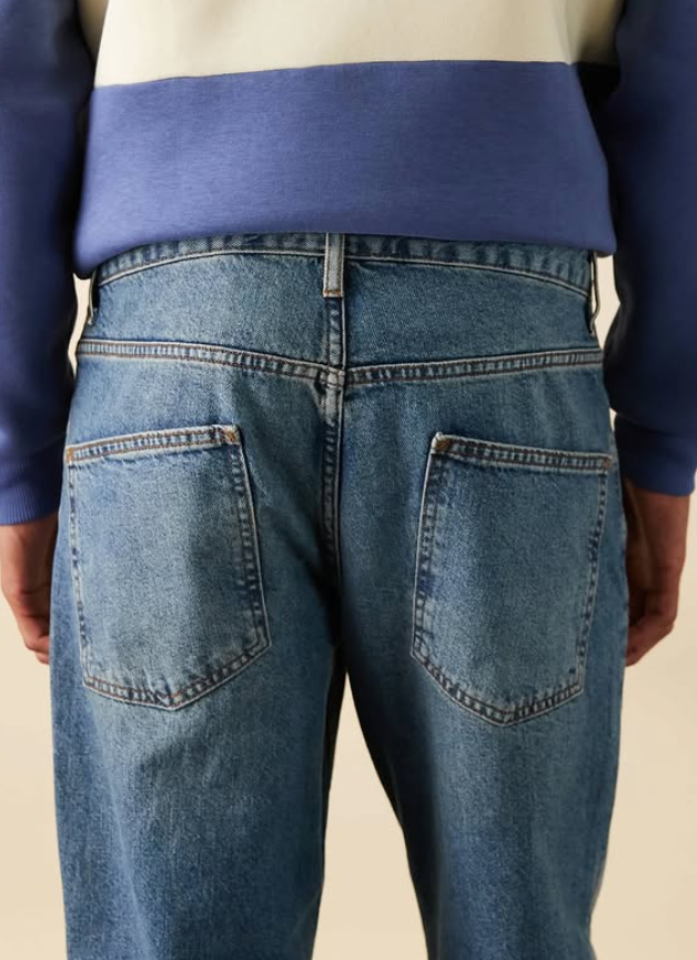 ASOS DESIGN tapered fit jeans in mid wash blue