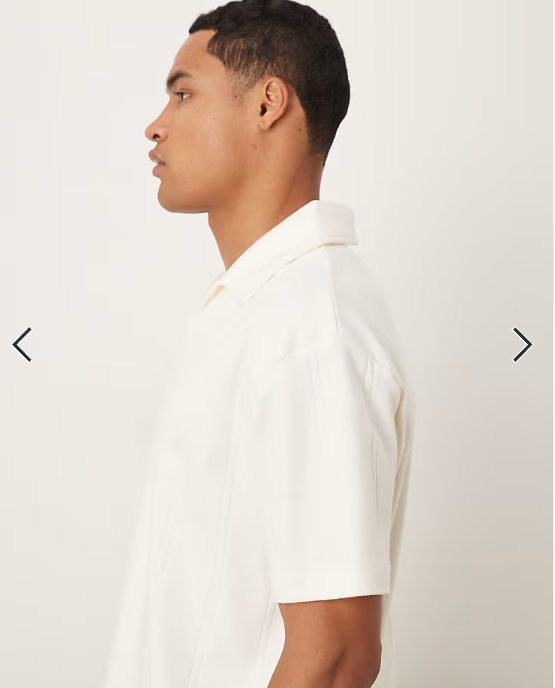 ASOS DESIGN relaxed revere collar boxy polo in cream textured rib