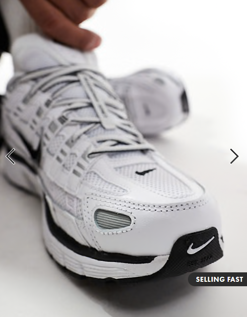 Nike P-6000 trainers in white and metallic silver
