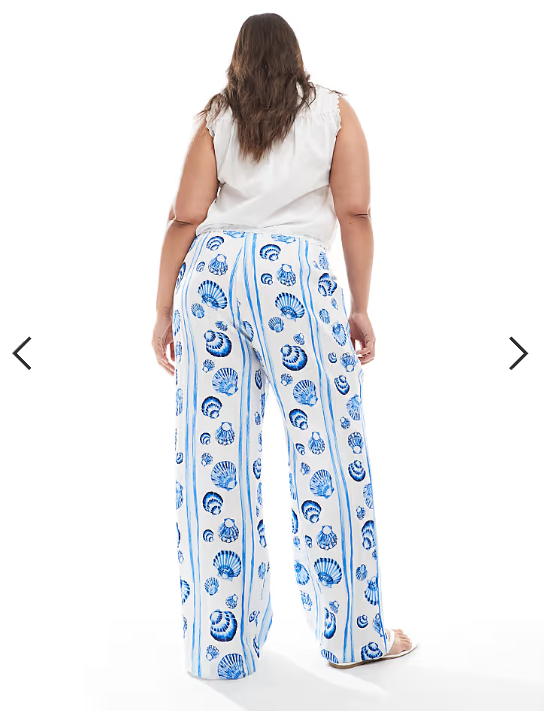 Vero Moda Curve wide leg trousers in blue seashell print