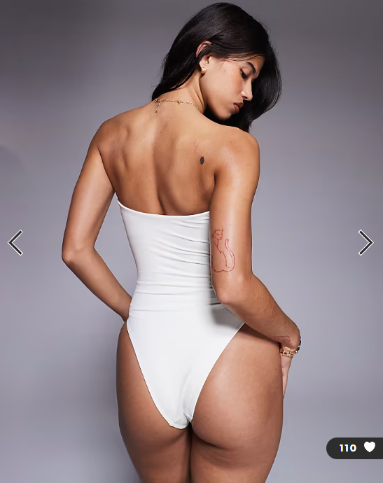 ASOS DESIGN paneled bandeau swimsuit with cut outs in cream