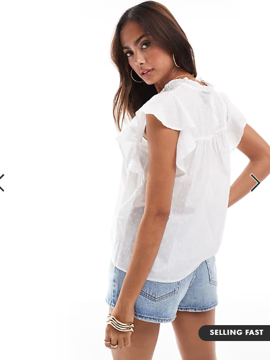 Vero Moda high neck flutter sleeved embroidered top in white