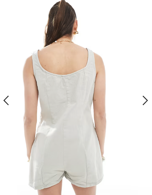 ASOS DESIGN denim scoop neck romper with pocket detail