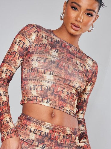 RED ABSTRACT PRINT LONG SLEEVED CROP TOP