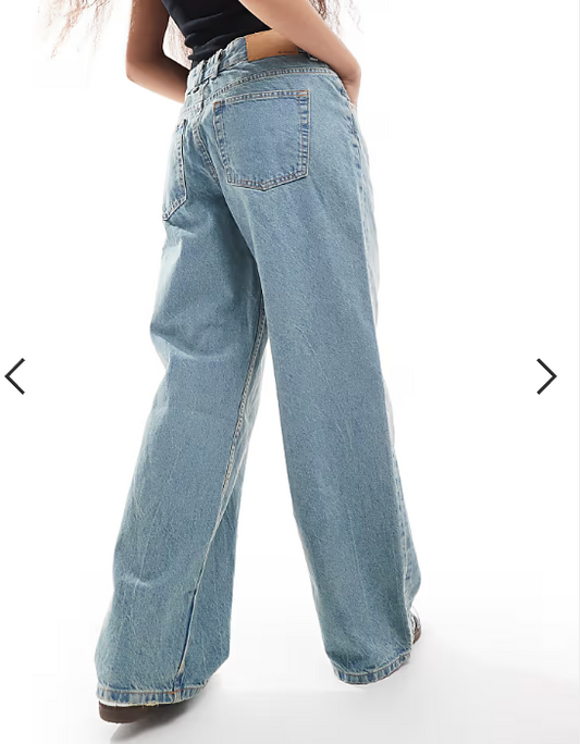 ASOS DESIGN Petite low rise baggy jeans in pale vintage blue