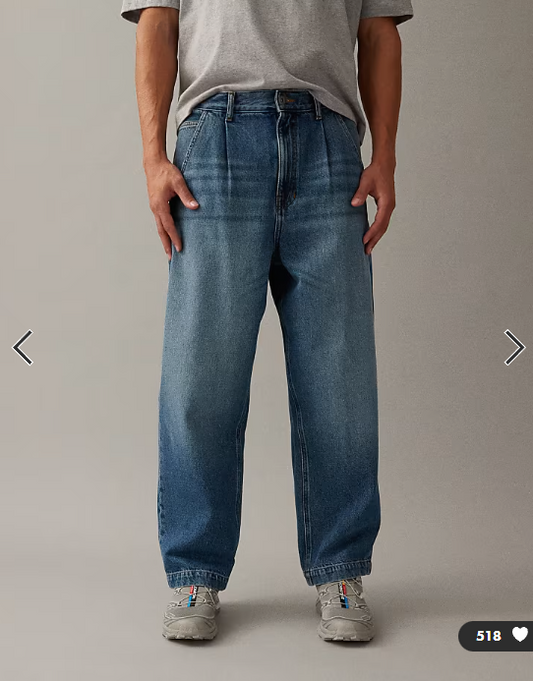 ASOS DESIGN relaxed tapered jeans in mid wash blue with pleats