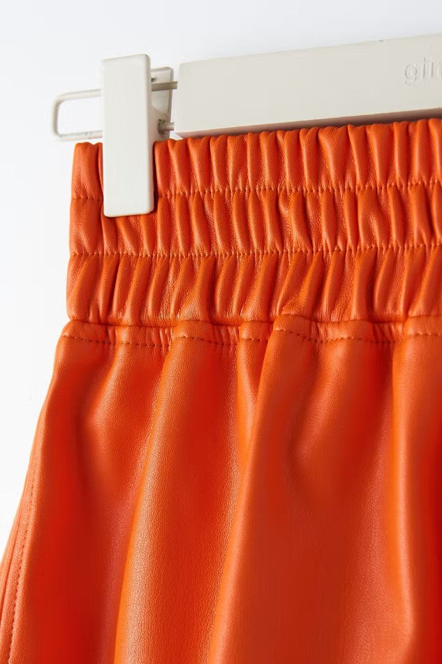 melina pu shorts orange