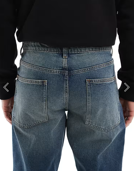 ASOS DESIGN tapered jeans with vintage tint in dark wash blue