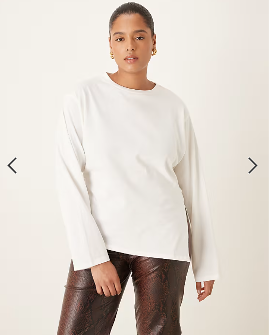 ASOS DESIGN Curve cinched waist asymmetric hem long sleeve tee in cream