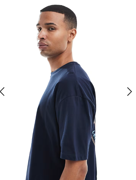 ASOS DESIGN oversized t-shirt with sports club front graphic in light brown.
